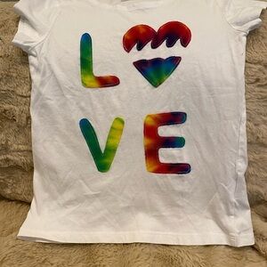 White T w/ colorful lettering spelling LOVE